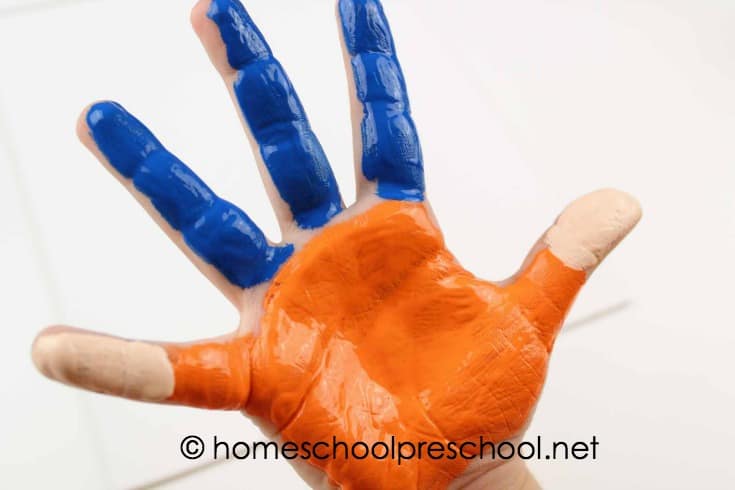 Turn your child's handprint into one of his favorite book characters with this If You Give a Mouse a Cookie handprint art project for kids!