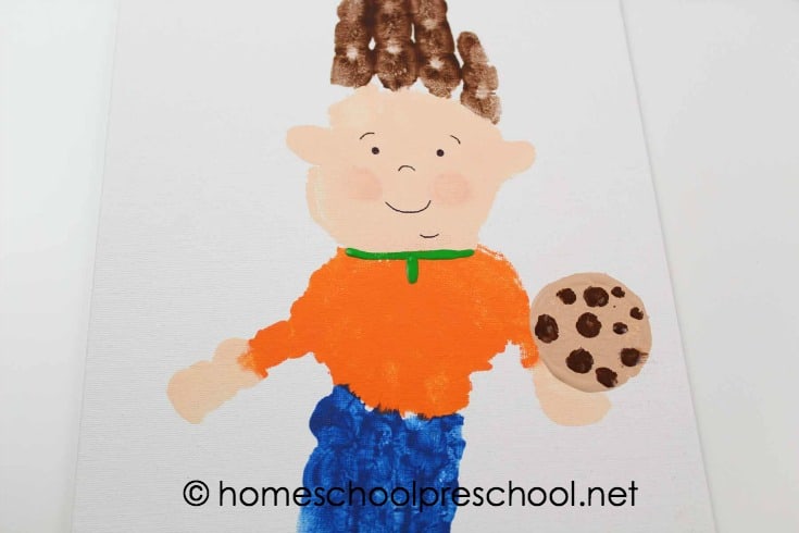 Turn your child's handprint into one of his favorite book characters with this If You Give a Mouse a Cookie handprint art project for kids!