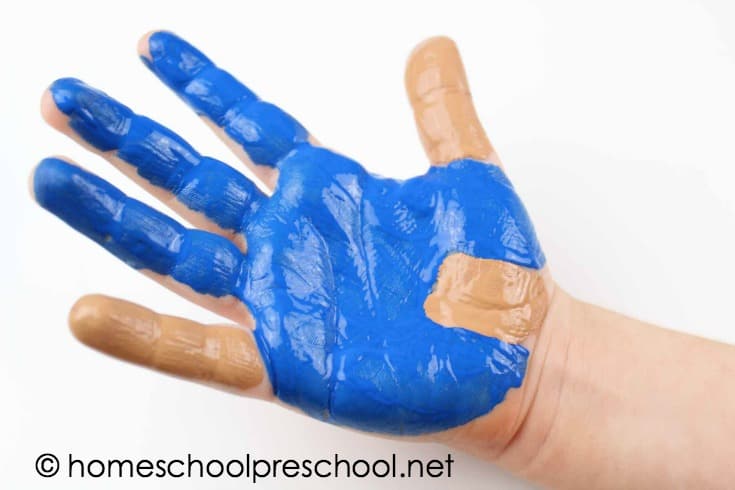 Turn your child's handprint into one of his favorite book characters with this If You Give a Mouse a Cookie handprint art project for kids!