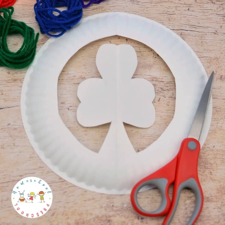 Your little crafters will love this St Patricks preschool shamrock craft! They'll build hand strength and motor skills with this fun lacing craft.