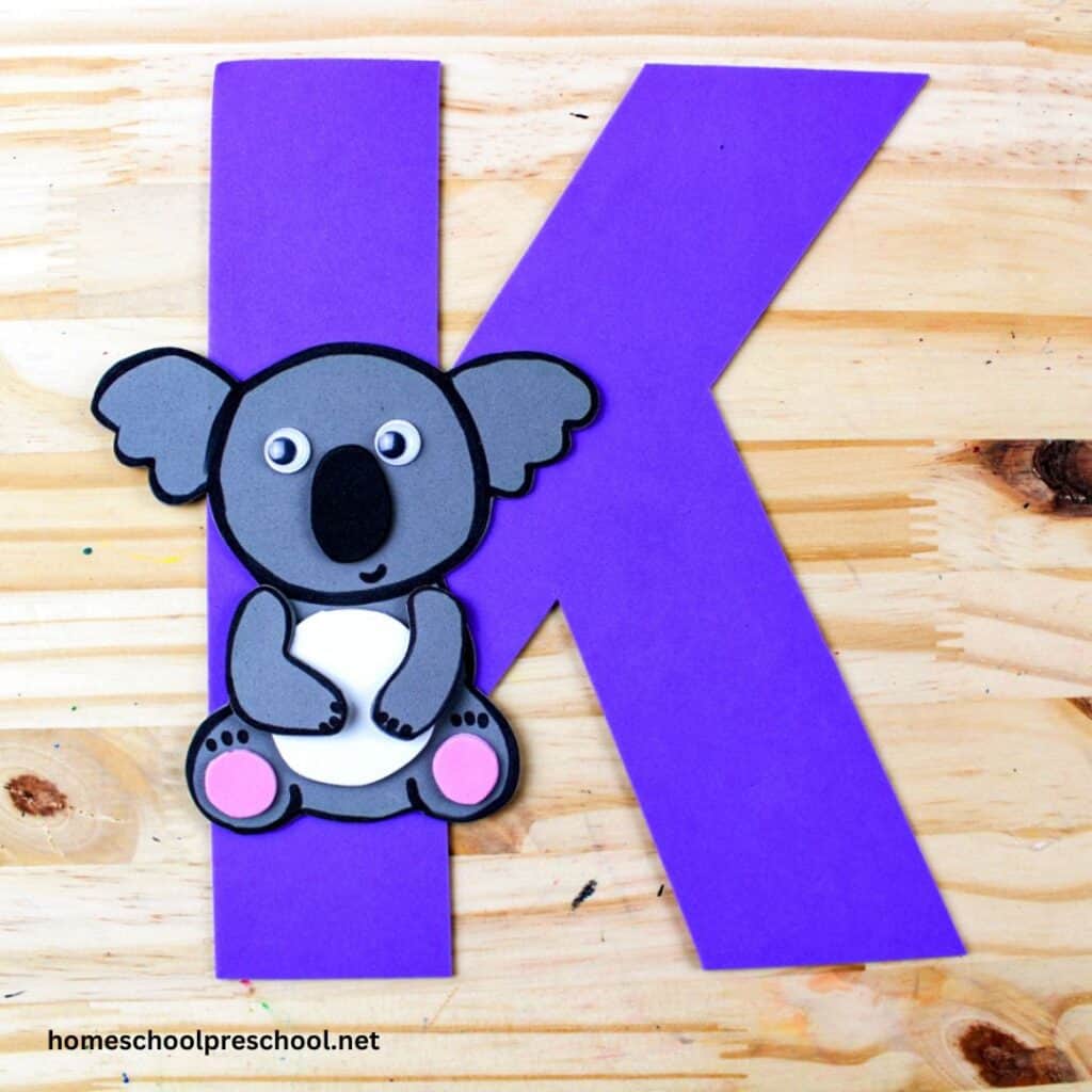 k is for koala craft on plywood background