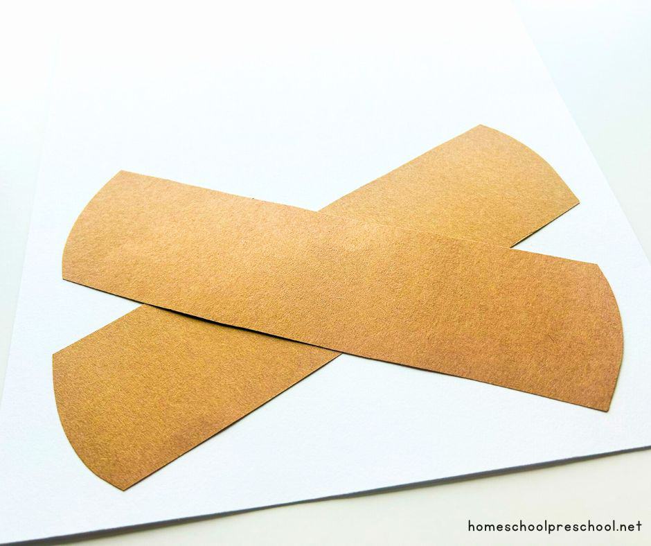 construction paper logs on cardstock