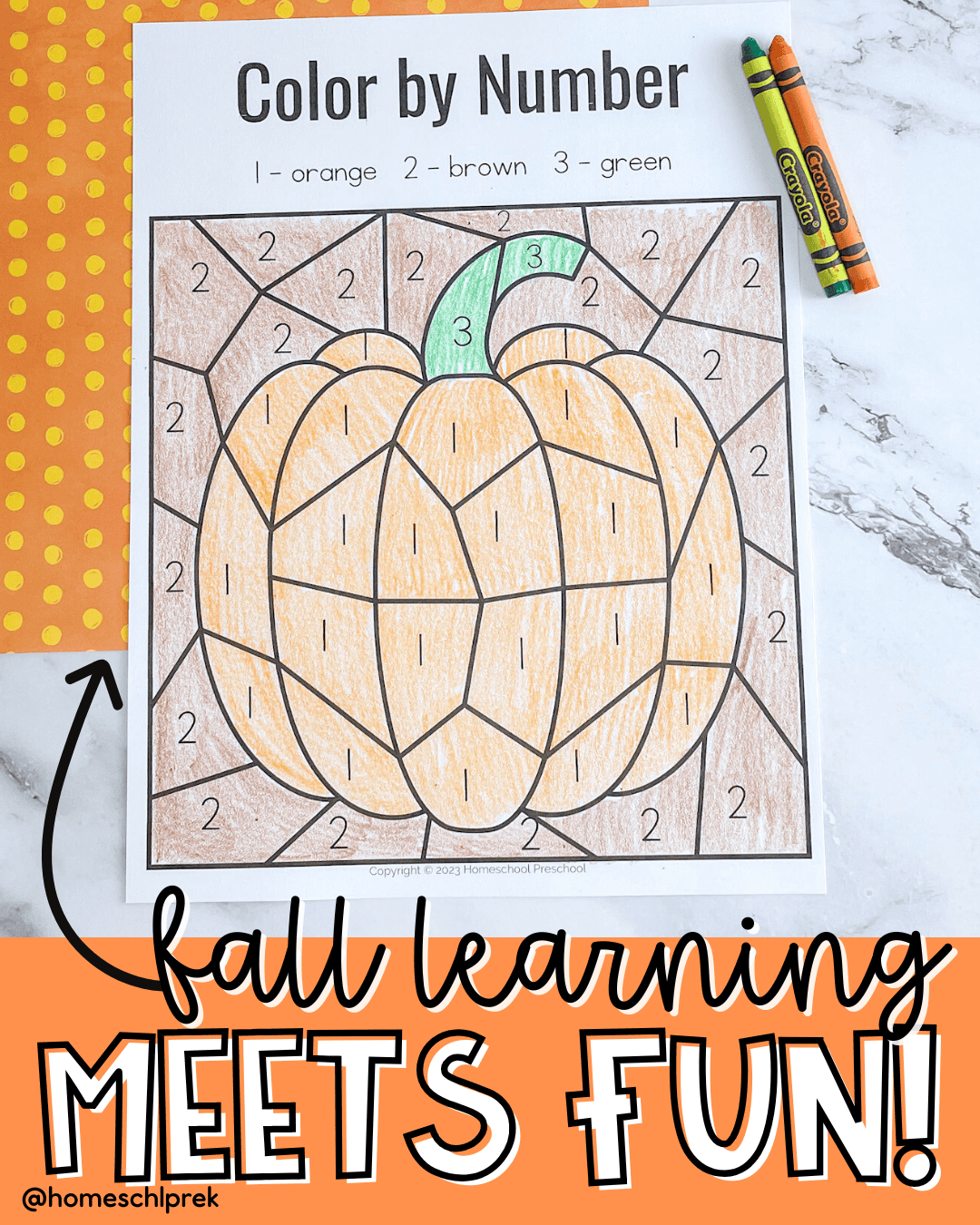 Free pumpkin color by number worksheet for preschoolers, colored with crayons.